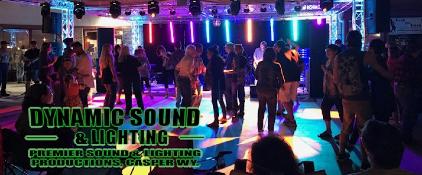 A group of people at a cooperate party dancing Dynamic Sound and Lighting Casper WY